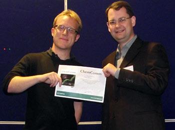 Dr. Rob Evans (Left) receiving the prize from Dr. Ian Day of the University of Sussex